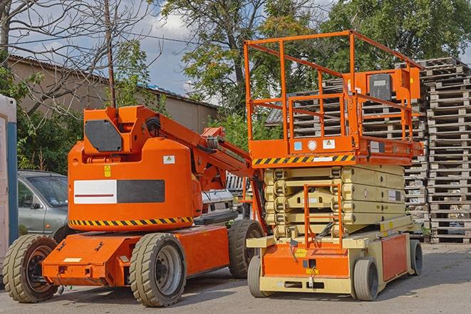 forklift carrying pallets in warehouse in Mcclellan, CA